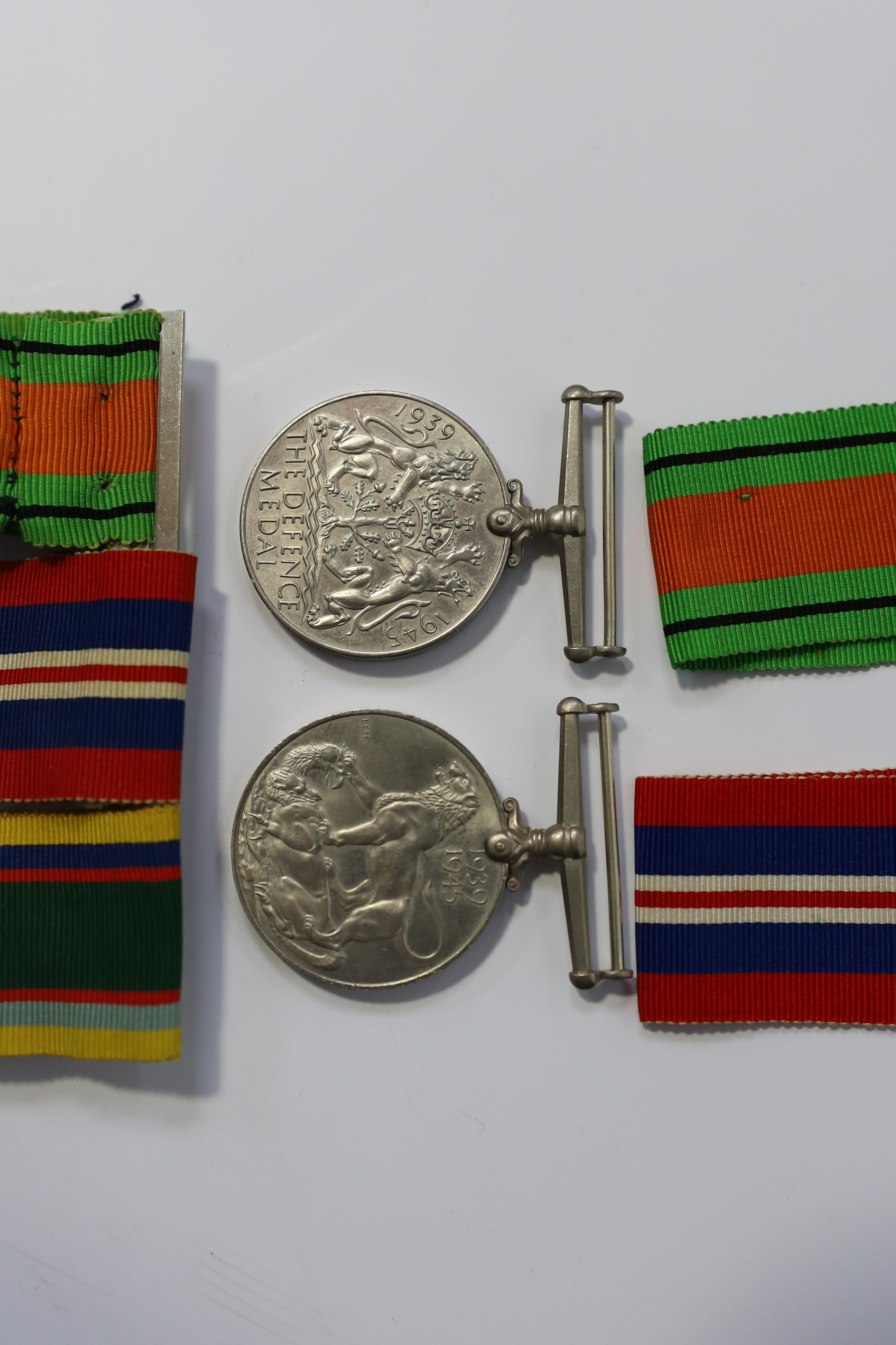 A group of assorted medals; WW2/ERII Cadet Forces medal group of 3 with two clasps to Fg.Off.W.K.Winstone R.A.F.V.R.(T); ERII RAFLSGC to Cpl B.K.Stockwell (F2570477) in box; WW2 Dm & WM. Condition - fair to good.